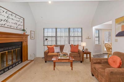 Bright Blue Springs home with a stunning open floo Main Photo