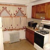 Photo 2: bright and sunny kitchen