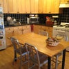 Photo 3: The kitchen is large and has many appliances, and even a wine fridge (not pictured)