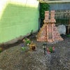 Photo 6: Yes, a pyramid in the yard.