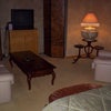 Photo 2: Lounge area opposite bed.