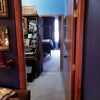 Photo 4: The view from the living room through the old timey room to your private bedroom