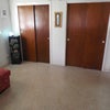 Photo 3: Full wall of closet space floor to ceiling. Photog. was facing north when taking this photo.