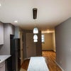 Photo 3: Kitchen/living space