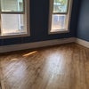 Photo 2: Windows to the south. Newly sanded floor.