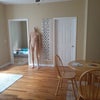 Photo 7: Main room and a peak at my room (mannequin isn't staying)