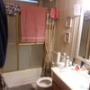 Photo 4: Shared bath (counter is kept empty)