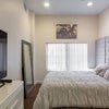 Photo 2: Bedroom has TV