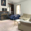 Photo 4: Fully furnished living room with large tv, comfy sectional and more!