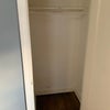 Photo 2: Private closet - deep w/ shelf and bar