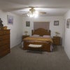 Photo 8: All wood furniture master bedroom and bath California King two end tables three armors ceiling fan w