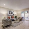 Photo 7: living room and private patio