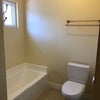 Photo 4: Tub in bathroom adjacent to shower