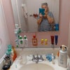 Photo 3: Bathroom sink/mirror 