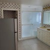 Photo 4: Refrigerator in Master Bathroom
