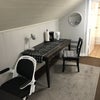 Photo 2: Upstairs suite second room with desk and office chair, large table and chair