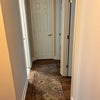 Photo 6: hallway leading up to bedroom/linen closet at end of hall goes w the room