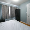Photo 3: Private furnished bedroom with bed, wardrobe, nightstand, air conditioner in the summer...