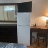 Photo 3: dresser,full refregirator,desk,tv