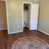 Photo 2: bedroom from different angle  to show closet.  Extra closet right outside the door goes w it