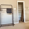 Photo 5: You'll get a clothes rack and a large closet with shelves