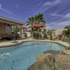 Photo 1: Tropical oasis of back yard, BBQ grill, fire pit, and 4 hole put put for golf behind BBQ grill