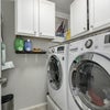 Photo 2: Samsung washer and dryer front load in laundry room