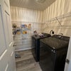 Photo 6: Shared pantry and laundry 