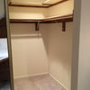 Photo 2: Walk in wardrobe with fridge