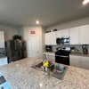 Photo 2: All new appliances and granite countertops (one-year old)