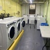 Photo 7: Laundry room in the basement 