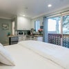 Photo 9: Studio has nice size closet with dresser. Beautiful view and very private. Fully stocked kitchen.