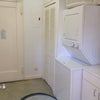 Photo 3: There is a laundry room in the apartment (that's an old school service entrance on the left.) 
