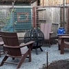 Photo 9: Back yard fire pit area