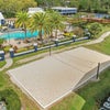 Photo 7: The Pool and Volleyball Net