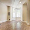 Photo 4: Living room and front door