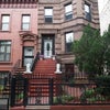 Photo 9: The Brooklyn brownstone with the two white line heads the home away from home. 