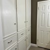 Photo 5: Restroom cabinet space 