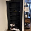 Photo 3: Bespoke bookshelf door to basement room