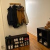 Photo 8: Front entrance coat/shoe racks