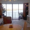 Photo 5: Living room and balcony.