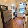 Photo 7: Kitchen with fridge, microwave, airfryer, hot water kettle and stove