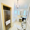 Photo 9: Shared Bath (Shower & Tub)
