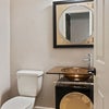 Photo 9: Half bath for guests