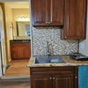 Photo 7: Tile backsplash, granite counters