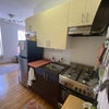 Photo 4: Kitchen, gas oven/stove, rolly cart for extra surface