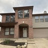 Photo 8: Front house 2 story 