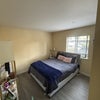 Photo 8: Larger Room with Queen size bed