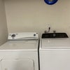 Photo 5: Washer and dryer in garage