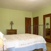 Photo 3: Large unfurnishe bedroom has two closets. 